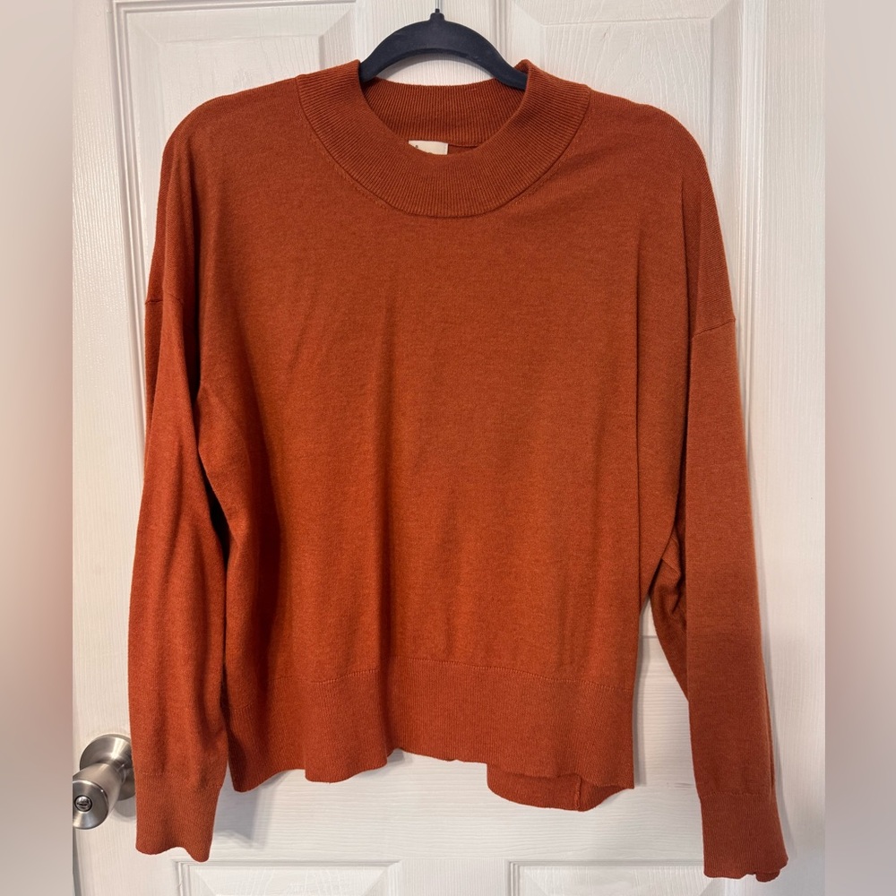 Orange sweater